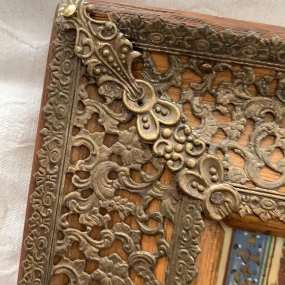 Hand painted on ivory? I am not an expert!! This is a very beautiful .